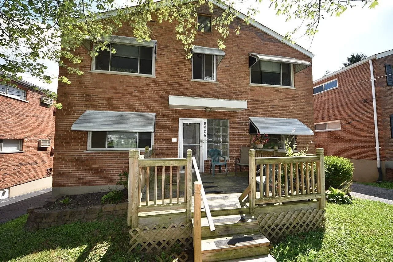 Brick apartment building entrance at 6405 Coffey Street